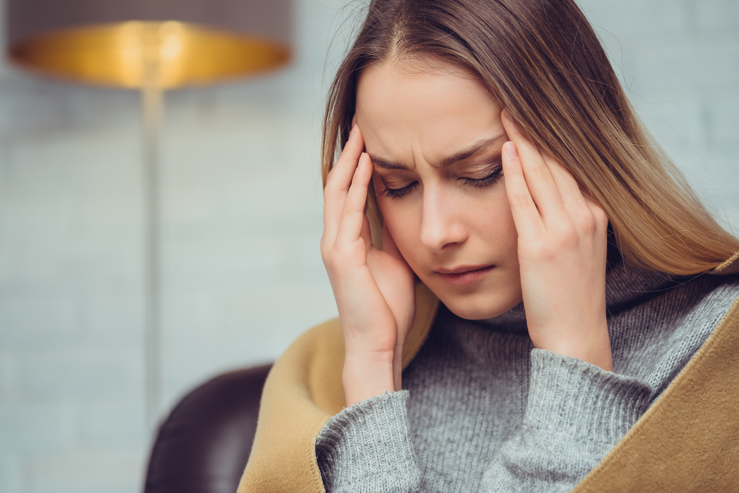 Lady with serious headache